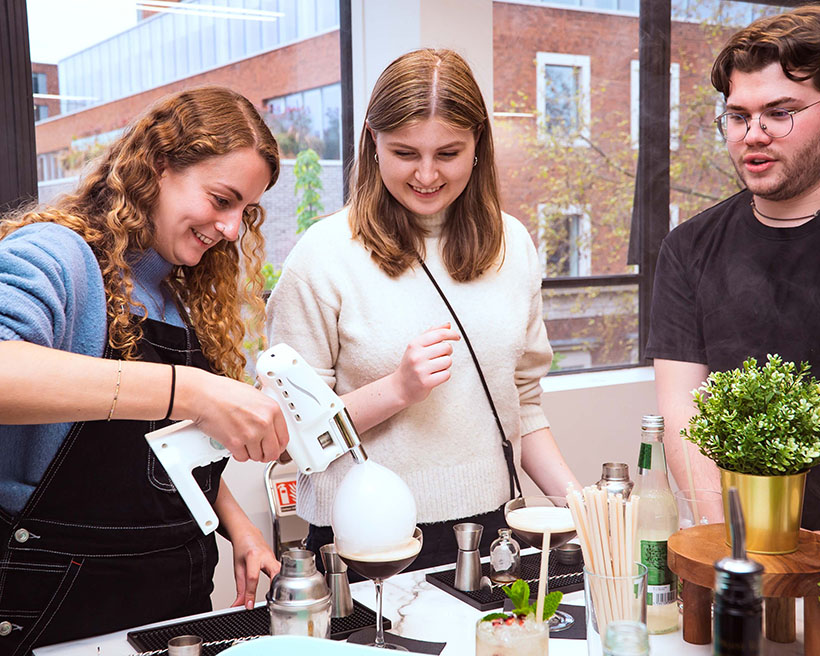People enjoing cocktail_making_using_flavourblaster_Cocktail Masterclasses_cocktail making session by Shake&Stir_Bar Set up example